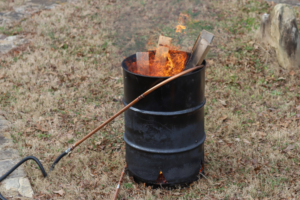 Converts a 55-gallon steel barrel into a wood stove