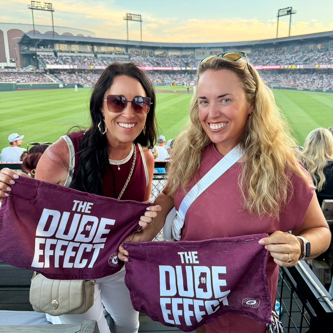 Two women in Left Field Lounge at Dudy Noble Field in Starkville, Mississippi